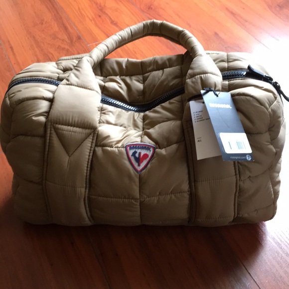 Urban Outfitters Handbags - Rossignol zip tote puffer bag